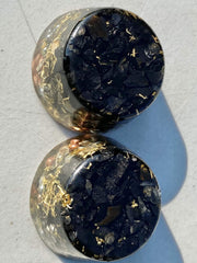 Generic Shungite Elite Noble tower buster in garden for positive energy dynamics.