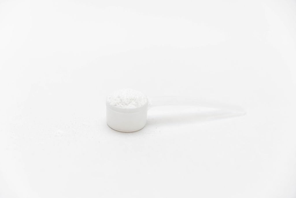 Athlete setup with Genetic Edge Creatine HCl + HMB for training consistency