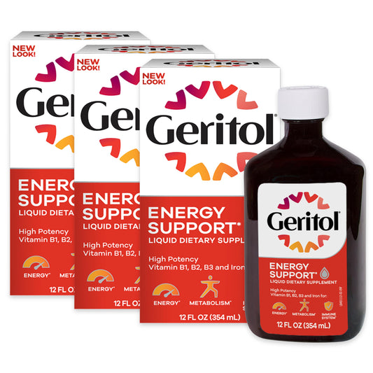 Geritol liquid bottle with label highlights energy support and essential vitamins.