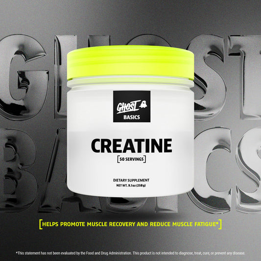 GHOST Basics Creatine serving scoop dispensing into a shaker for easy mixing.