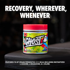 Ghost BCAA Blue Raspberry scoop beside powder, highlighting convenient pre/post workout fuel