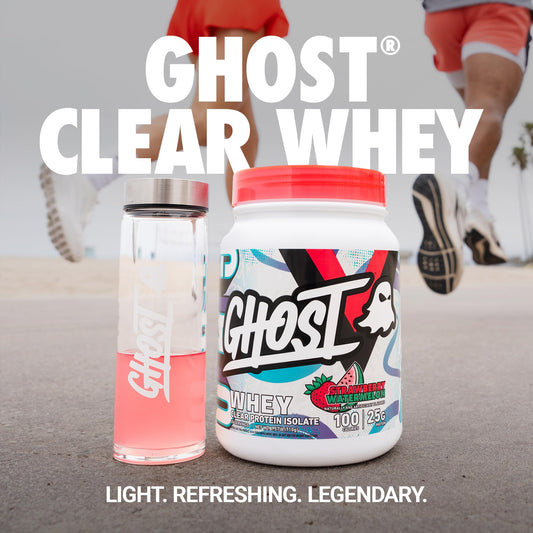 Pouring Ghost Clear Whey Isolate Strawberry Watermelon for a refreshing post-workout drink.