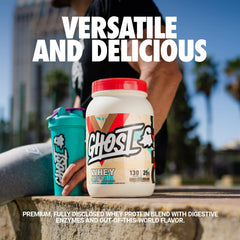 Ghost Whey Milk Chocolate scoop beside powder ideal for a quick protein shake.
