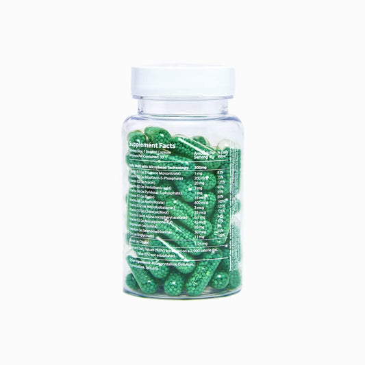 Giddy+Health multivitamin capsule-closeup shows a vegetarian microbead design.