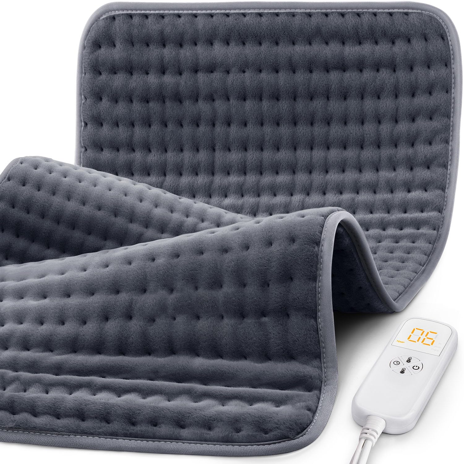 Glamigee extra-large heating pad on a couch providing full back warmth.