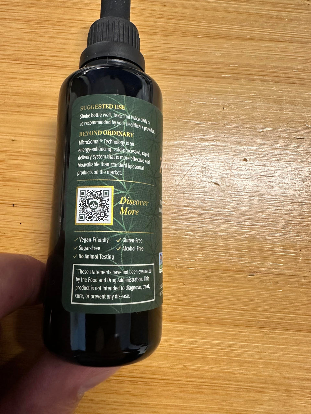 Global Healing Center zinc liquid dose-drops on table suggests simple daily use.