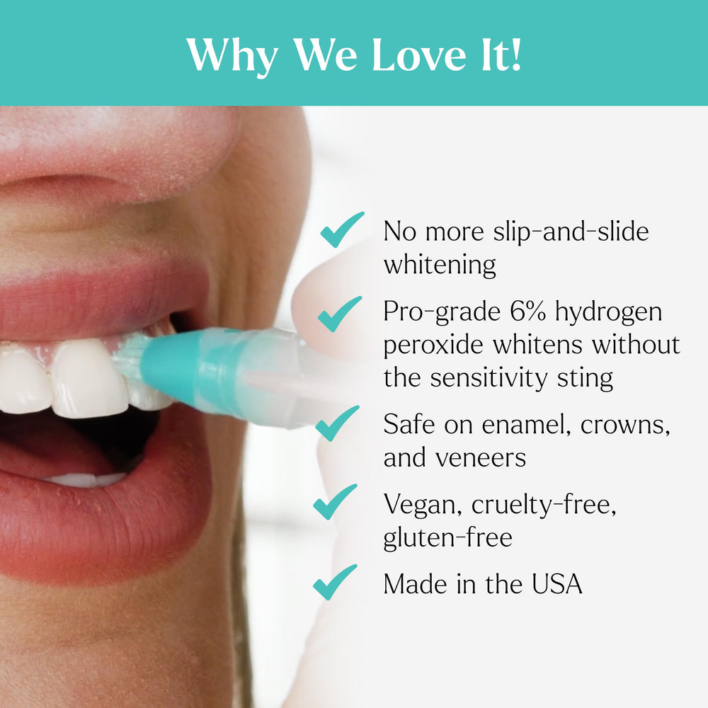 Toothbrush with gel applied, targeting visible teeth for even whitening.