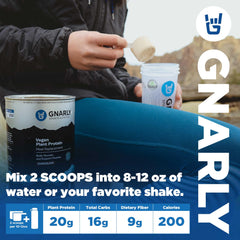 Mixing Gnarly vegan protein blend in bright kitchen for quick shake.