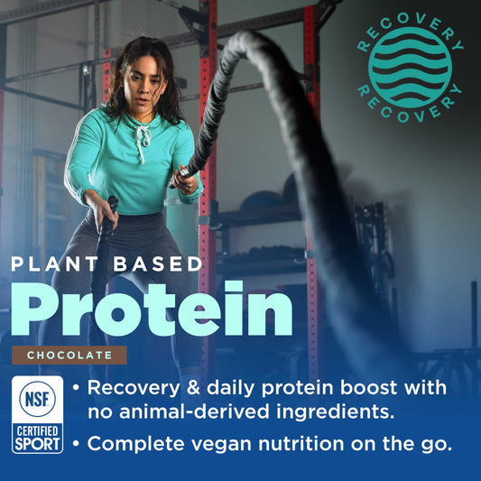Scoop of Gnarly Vegan Protein pouring into a glass for a creamy shake.