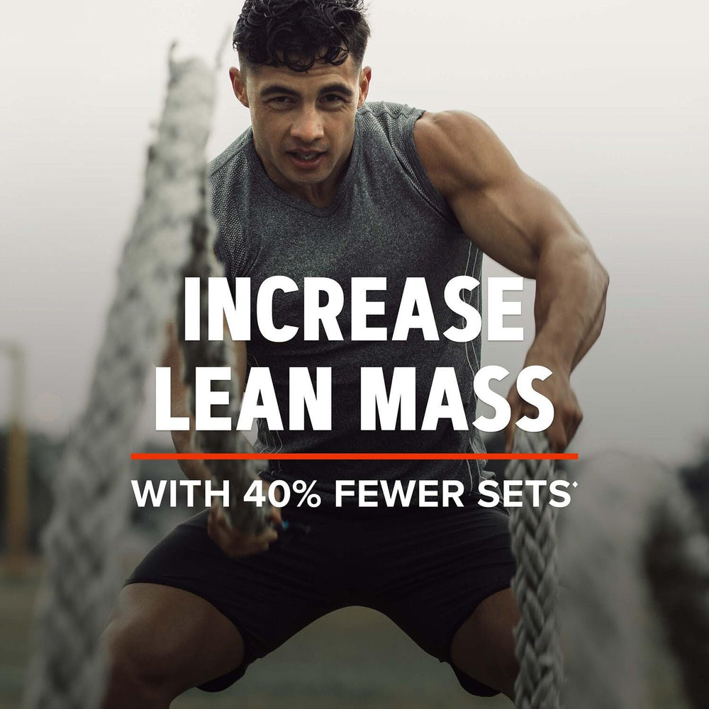 GNC AMP Mass XXX powder close-up highlights micronized protein and EAAs.
