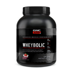 GNC AMP Wheybolic Strawberries & Cream bottle on shelf for convenient protein support.