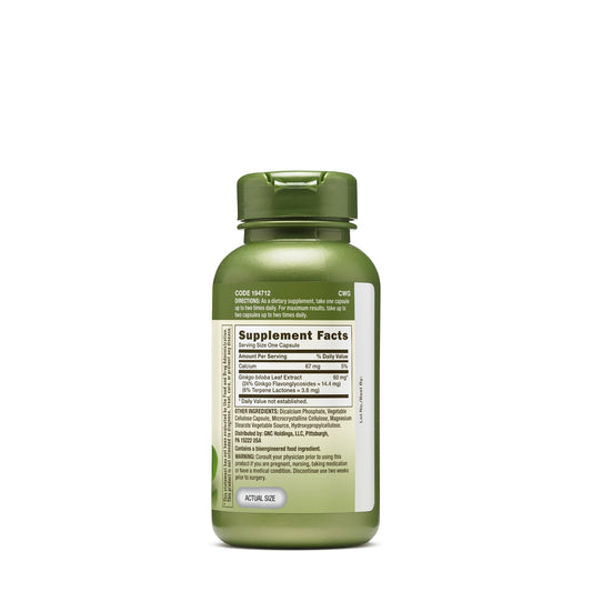 Close-up of GNC capsules emphasizes vegetarian formula for daily concentration.