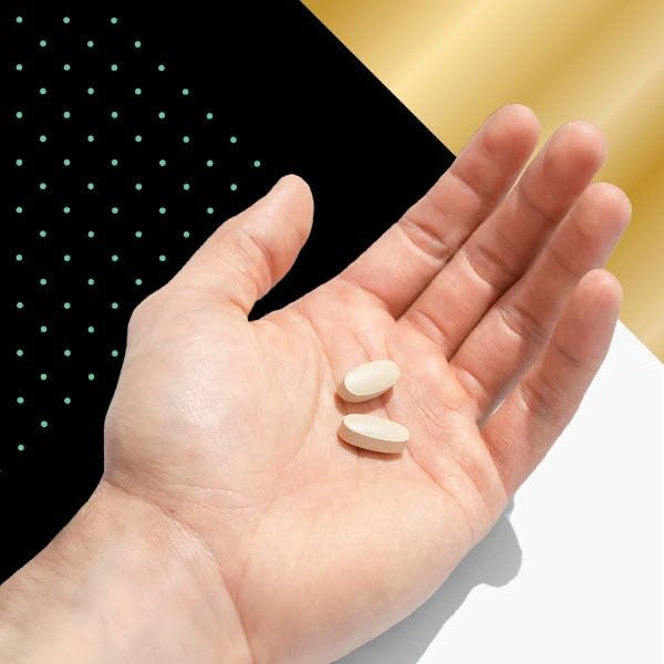 GNC Mega Men 50 Plus caplets dispensing from a bottle for daily routine