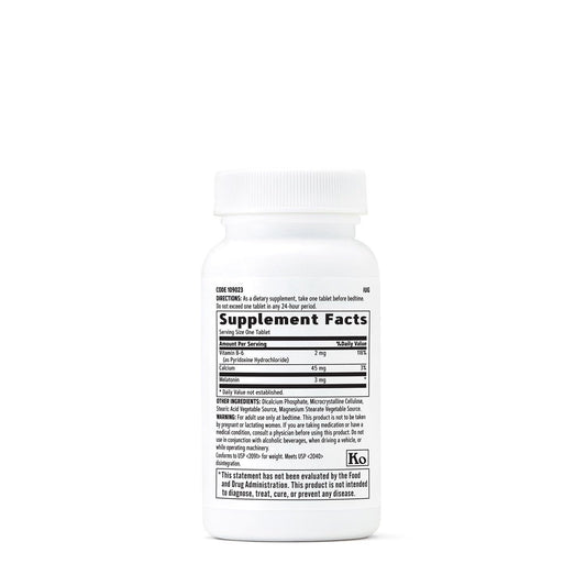 Close-up of GNC Melatonin 3mg lozenge dissolving