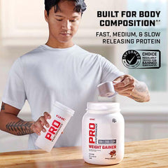 GNC Pro Performance Weight Gainer powder pouring into a shaker for easy mixing.