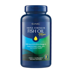 GNC Triple Strength Fish Oil mini softgel bottle supports daily omega-3 intake.