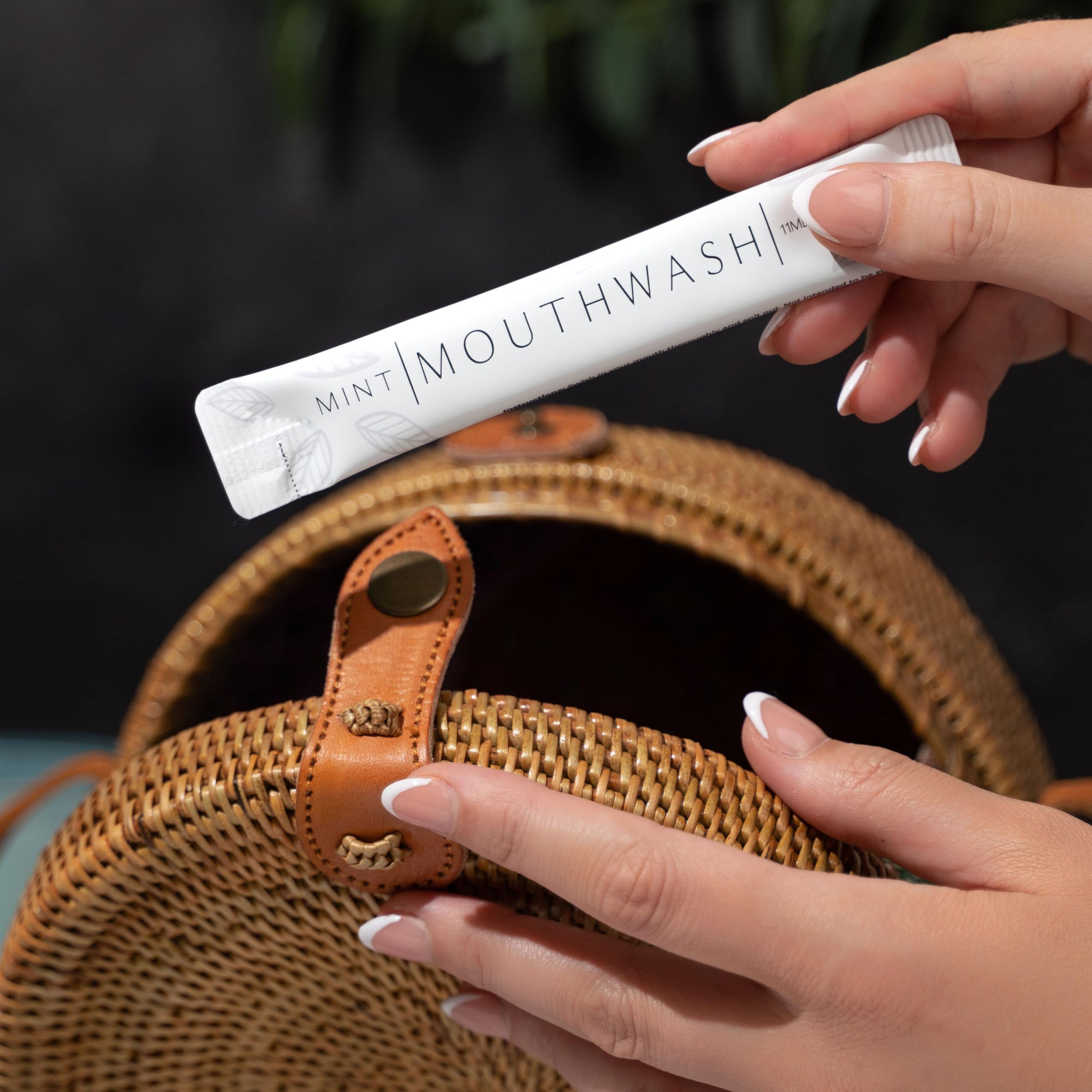 Close-up of Go Mouthwash travel packet highlighting compact, mess-free travel freshness.