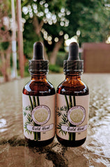 Gold Heal drops pouring into water for easy dosing and daily immune support.