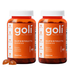 Goli Superfruits gummy bottle close-up highlighting brand and color.