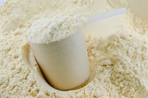 Goliath Labs athlete holding tub, showing versatile workout use.