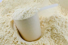 Goliath Labs athlete holding tub, showing versatile workout use.