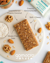 GoMacro ingredients glow shot featuring coconut, walnuts, and almond butter