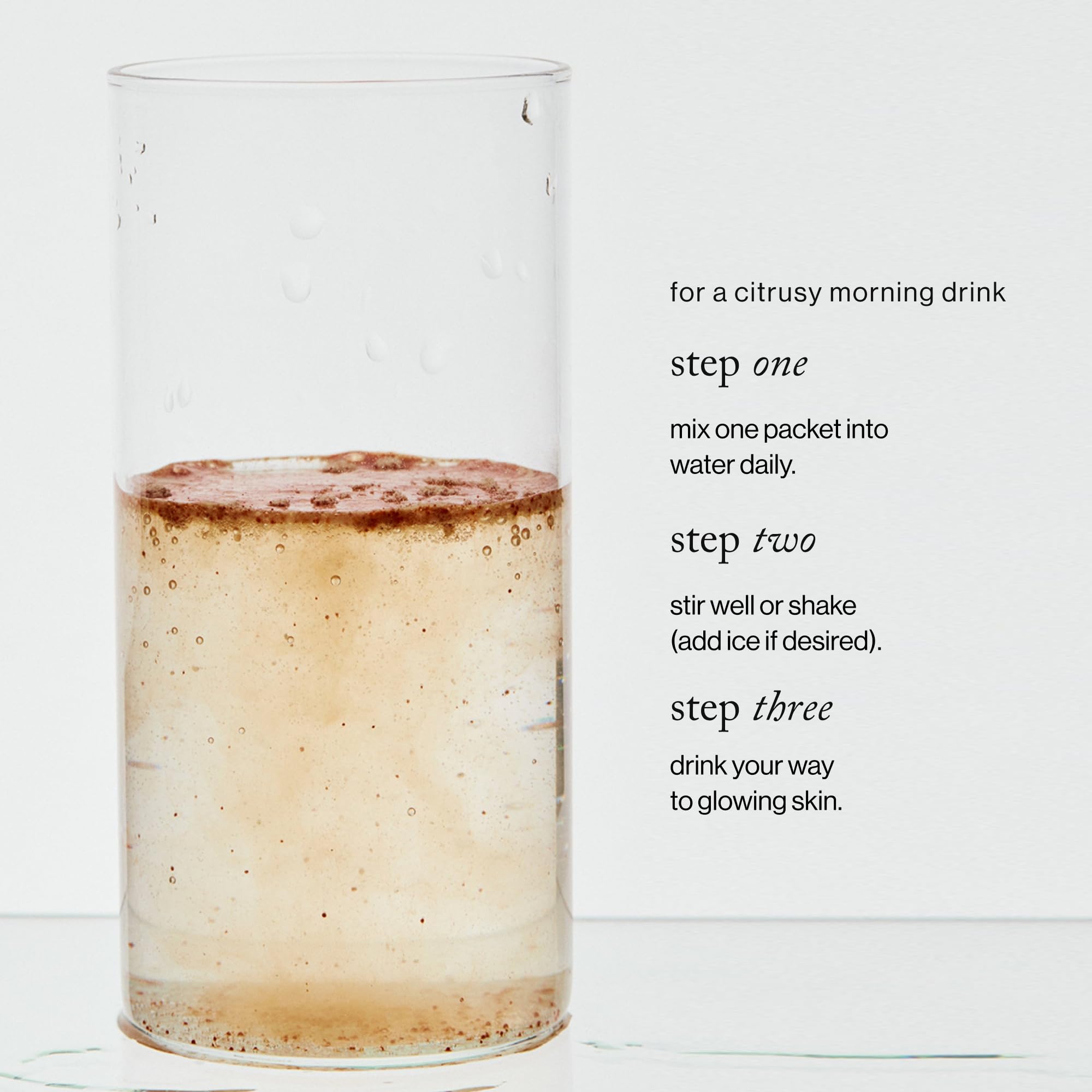 Goop Beauty Morning Skin Drink Mix citrus aroma in a glass for hydration.