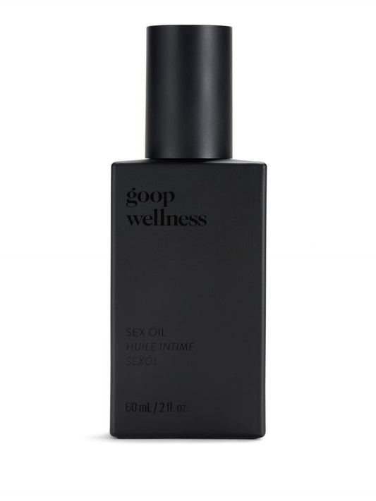 goop Wellness Sex Oil bottle being poured for a mess-free at-home massage.