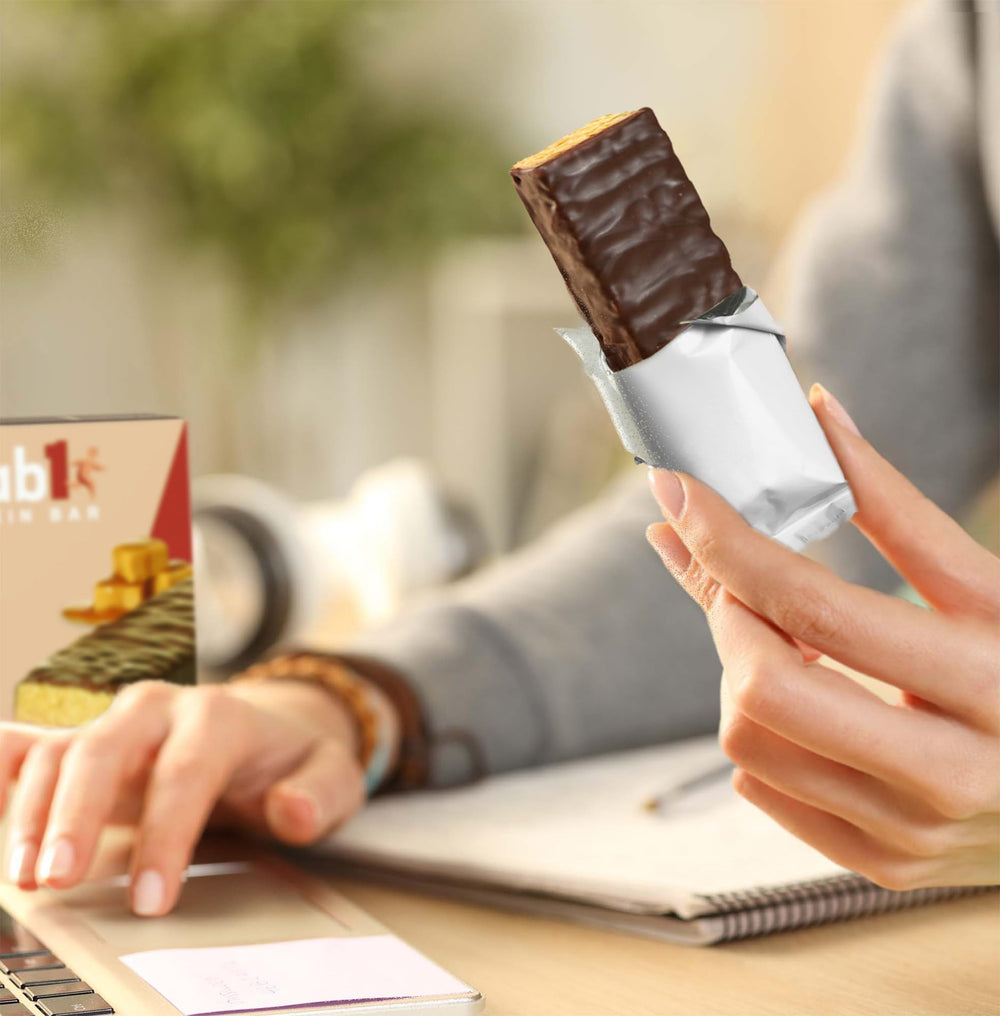 Grab1 Caramel Deluxe bar ingredients image emphasizes wholesome oats and soy protein