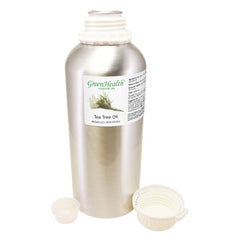Closeup label of GreenHealth Tea Tree Oil emphasizing purity