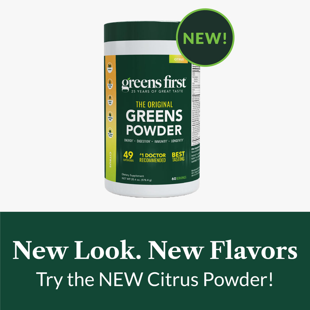 Vegan, non-GMO label on Greens First bottle indicating clean nutrition