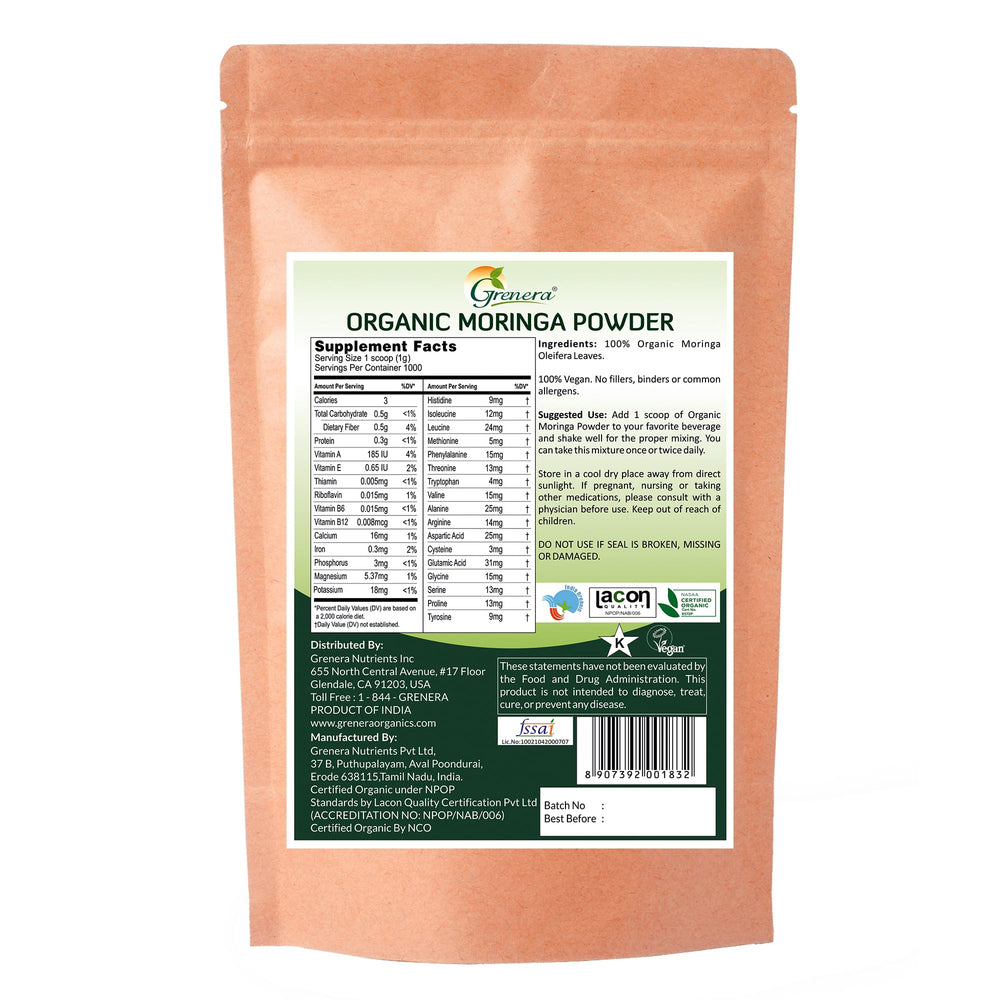 Grenera Moringa Powder on kitchen counter with measuring spoon.