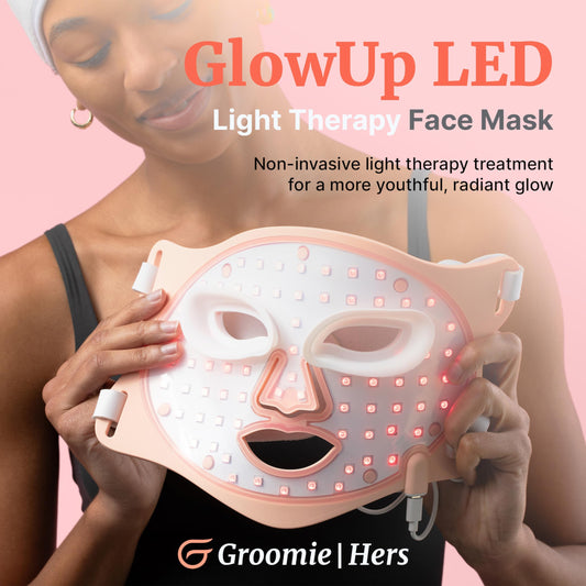 Groomie GlowUp LED mask in amber mode for even skin tone and glow