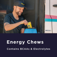 Runner grabbing GU Energy Chews Salted Lime during a training run.