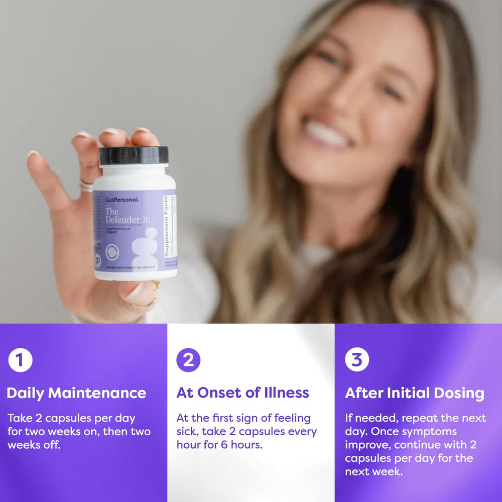 GutPersonal Defender elderberry bottle closeup emphasizing immune-supporting botanicals.