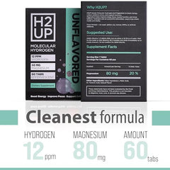 H2UP hydrogen tablet dissolving in water glass showing hydrogen delivery