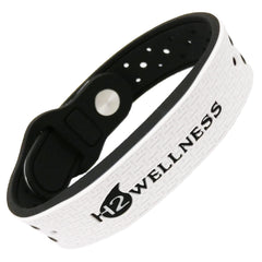 H2WELLNESS magnetic bracelet on wrist showing ultra-strength magnets for daily wear