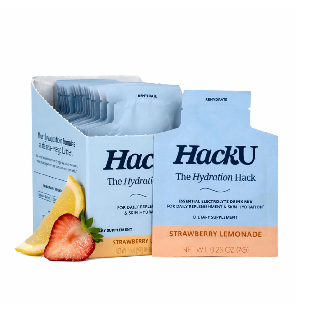 HackU electrolyte packets pouring into a glass for refreshing hydration with strawberry-lemonade flavor
