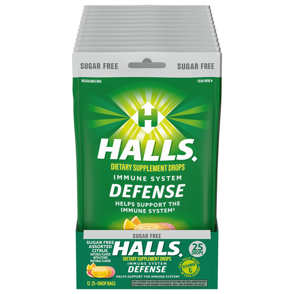 HALLS Defense vitamin C drops bottle with citrus flavor for daily immune support.
