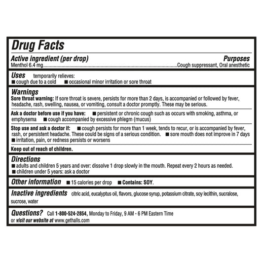 HALLS Mentho-Lyptus drops closeup; cooling menthol flavor ready to dissolve.