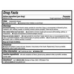 HALLS Mentho-Lyptus drops closeup; cooling menthol flavor ready to dissolve.