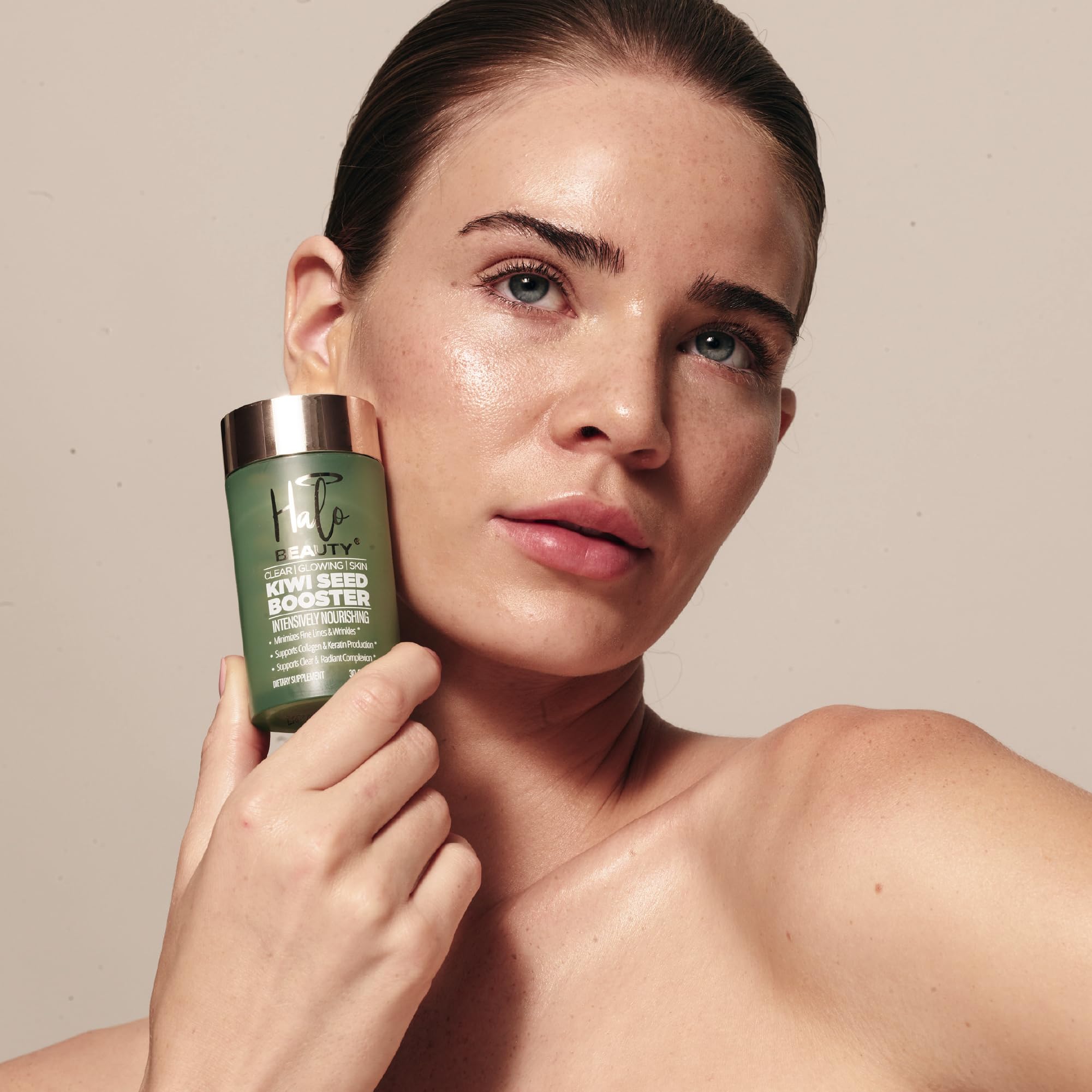 Halo Beauty Kiwi Seed Booster capsule ready for your daily routine.