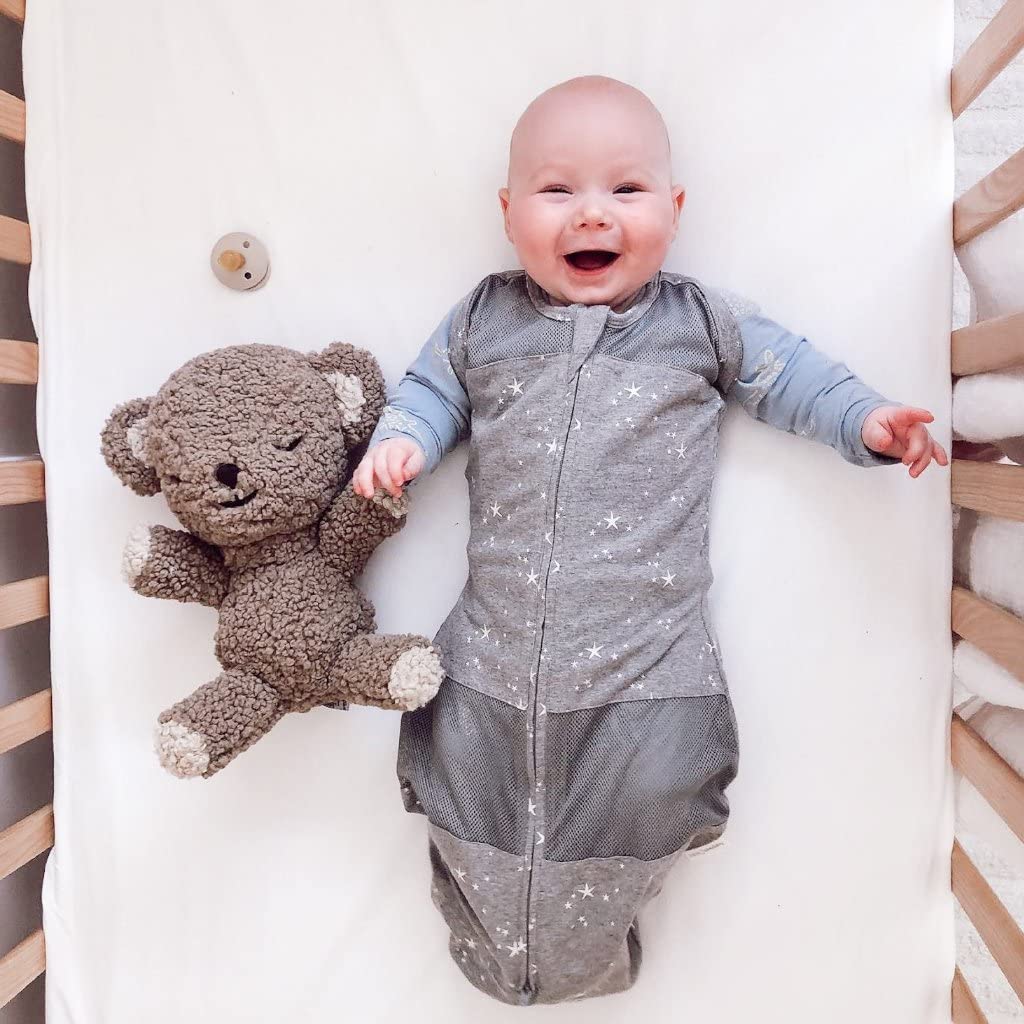 Happiest Baby SNOObear travel strap secures the soothing companion in motion.