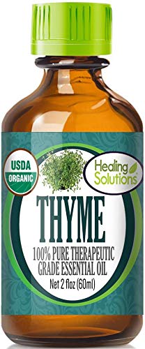 Healing Solutions Thyme Oil bottle closeup highlighting purity for diffuser blends.