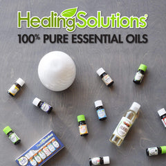 Healing Solutions cinnamon bark essential oil packaging label close-up.