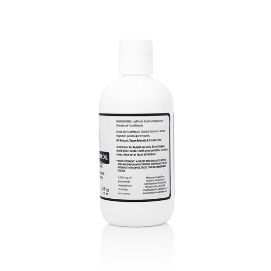 Health As It Ought To Be Dead Sea Magnesium Oil application close-up showing skin absorption.