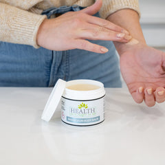 Health As It Ought To Be magnesium balm tub close-up showing creamy texture