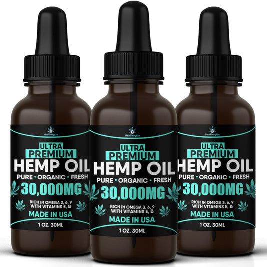 Healthergize hemp oil bottle pour for daily use and mood balance.