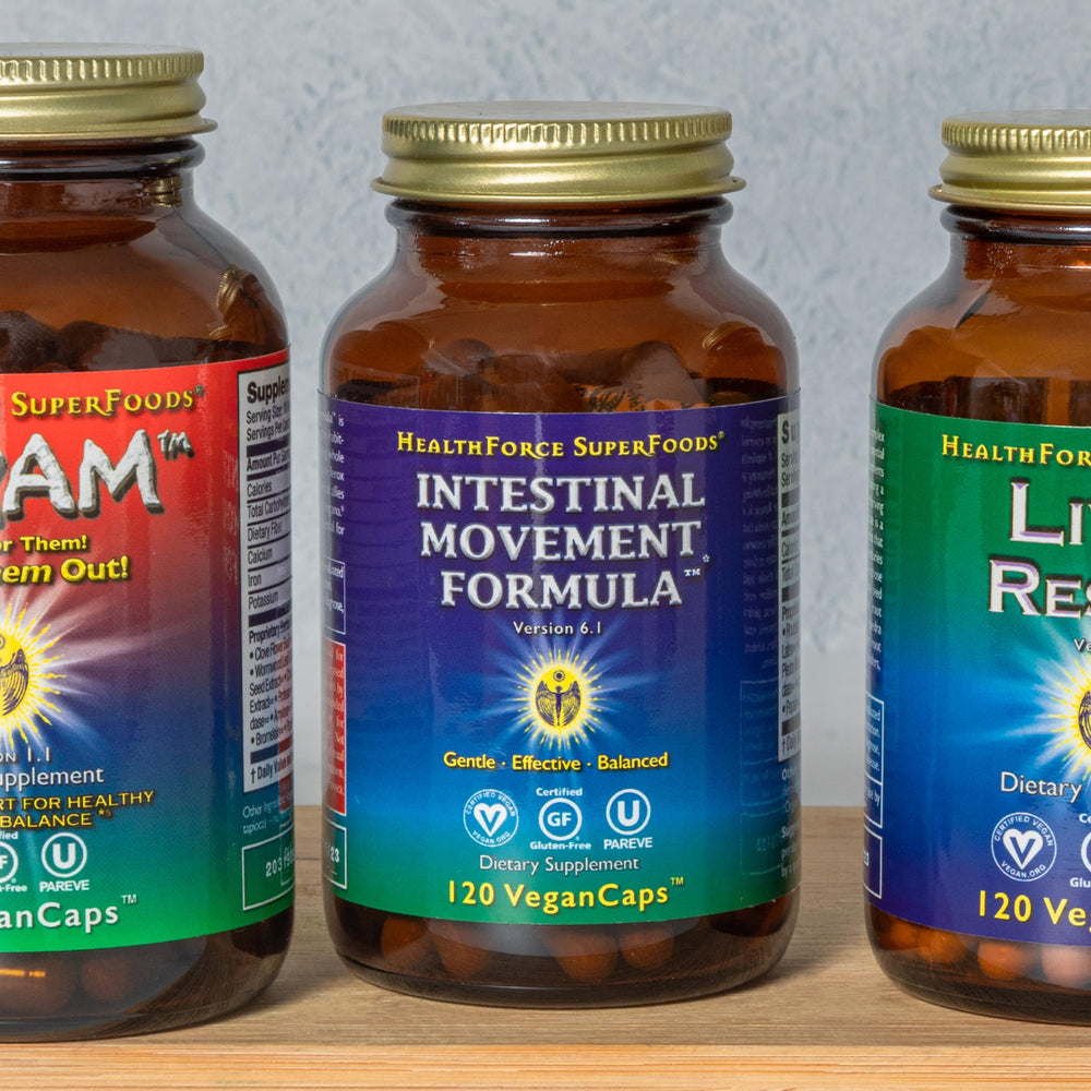 HealthForce Intestinal Movement Formula capsules with natural light for plant-based care
