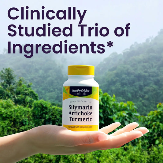 Healthy Origins Silymarin Artichoke Turmeric capsules in hand suggest daily digestion support.